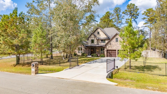 view of front of property featuring a garage and a front lawn