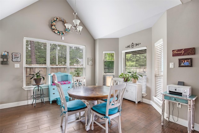 dining area featuring dark hardwood / wood-style flooring, vaulted ceiling, and a notable chandelier