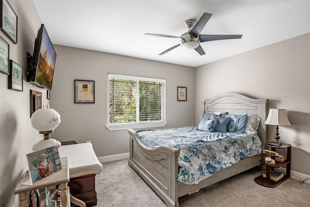 bedroom with light colored carpet and ceiling fan