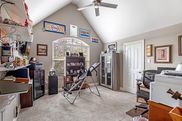 carpeted office featuring ceiling fan and lofted ceiling