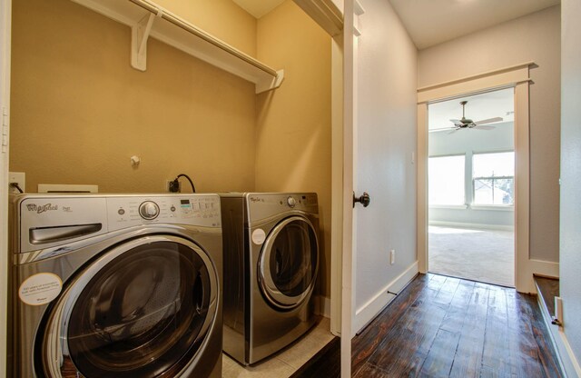 washroom featuring washer and clothes dryer, ceiling fan, and dark hardwood / wood-style floors