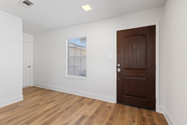 entryway with light hardwood / wood-style flooring