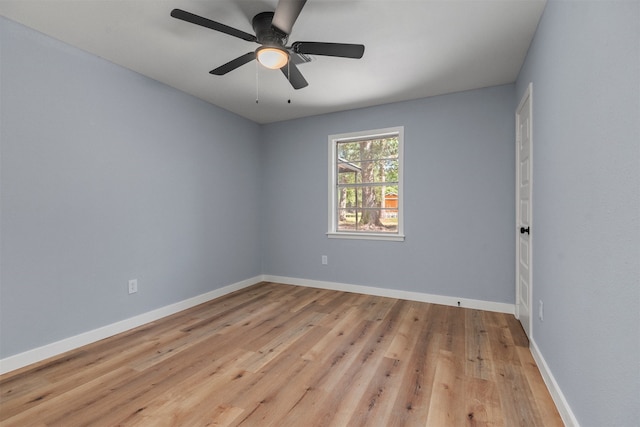 unfurnished room featuring ceiling fan and light wood-type flooring