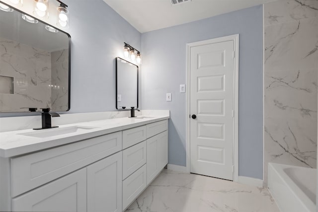 bathroom featuring washtub / shower combination and vanity