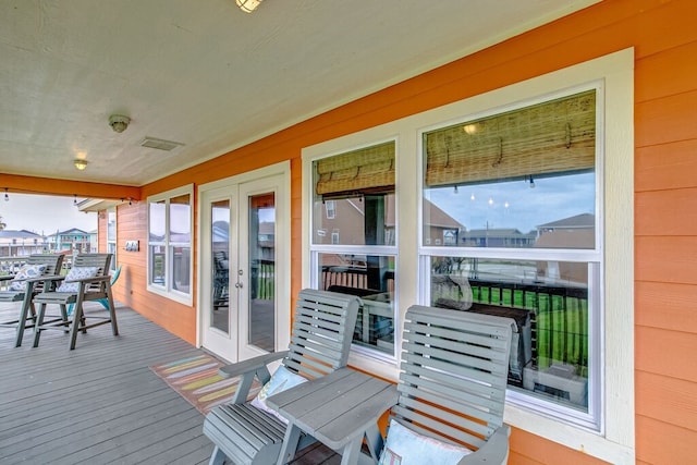 wooden terrace with french doors