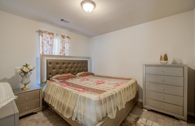 bedroom featuring light carpet