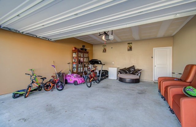 garage featuring a garage door opener