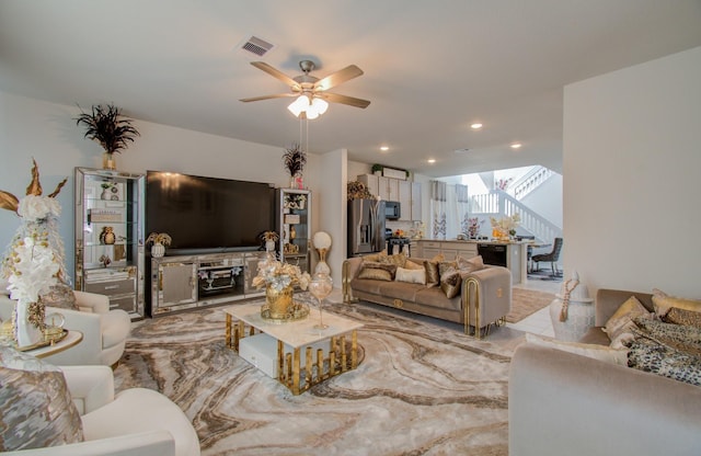 living room with ceiling fan