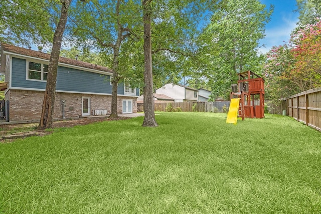 view of yard featuring a playground