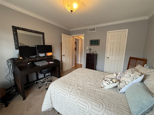 bedroom featuring crown molding and carpet floors