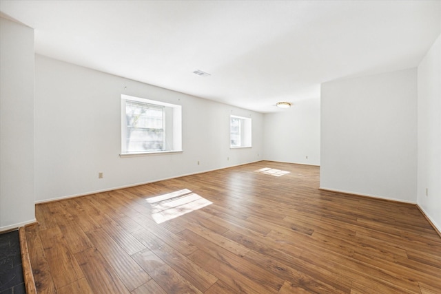 empty room featuring hardwood / wood-style floors