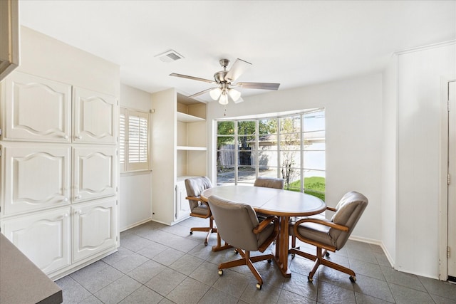 dining space with ceiling fan