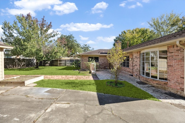 view of yard with a patio area