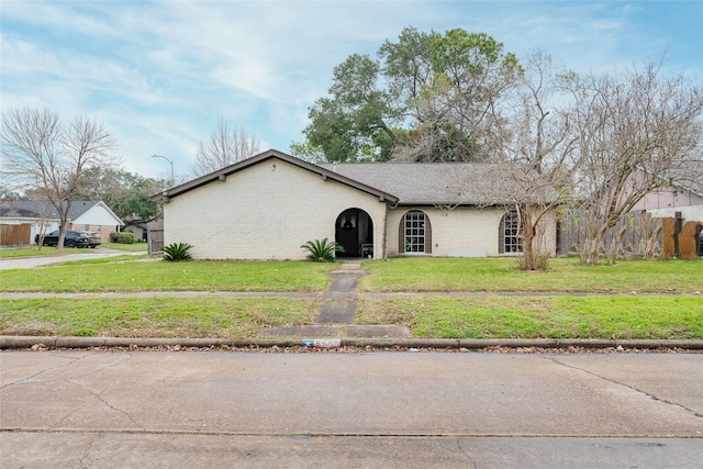 view of front of house with a front lawn