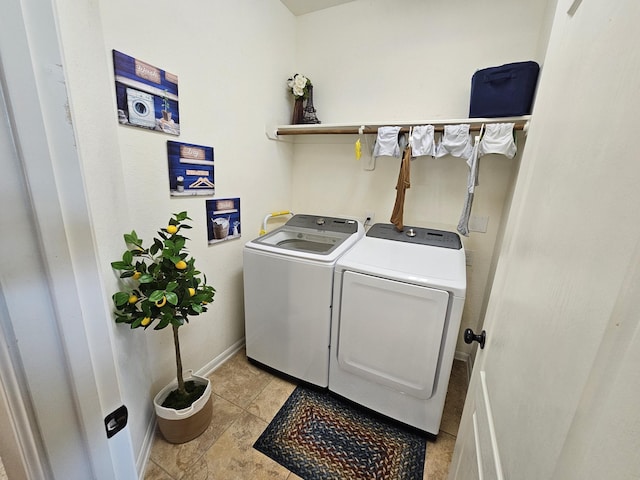 laundry room with washing machine and dryer