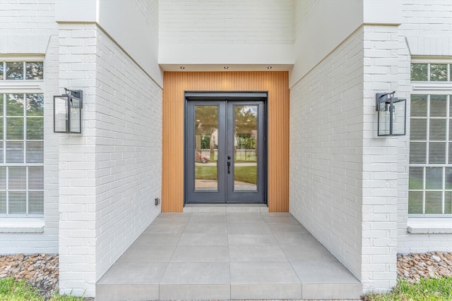 entrance to property featuring french doors