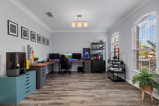 office featuring ornamental molding and light wood-type flooring