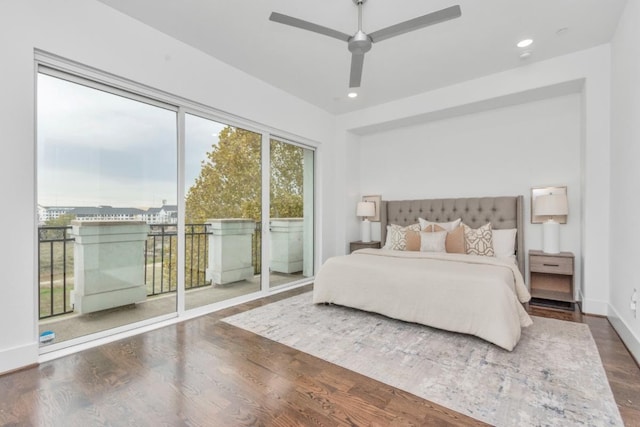 bedroom featuring access to exterior, dark hardwood / wood-style flooring, and ceiling fan