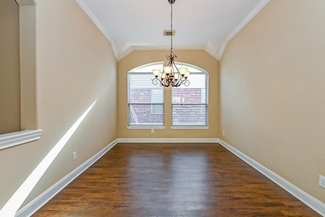 unfurnished dining area with an inviting chandelier, vaulted ceiling, dark hardwood / wood-style floors, and ornamental molding