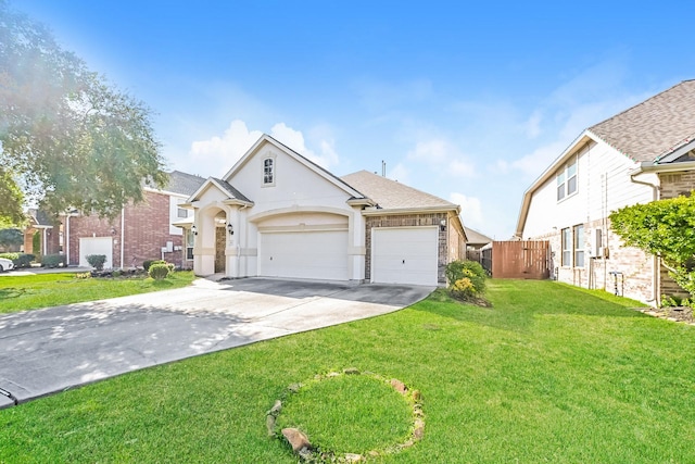 view of front facade featuring a front yard and a garage