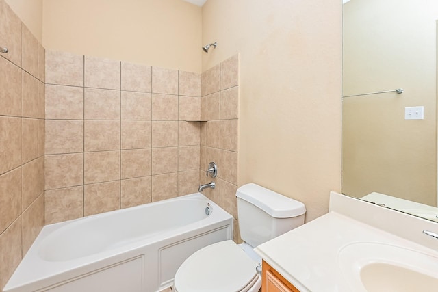 full bathroom featuring vanity, toilet, and tiled shower / bath