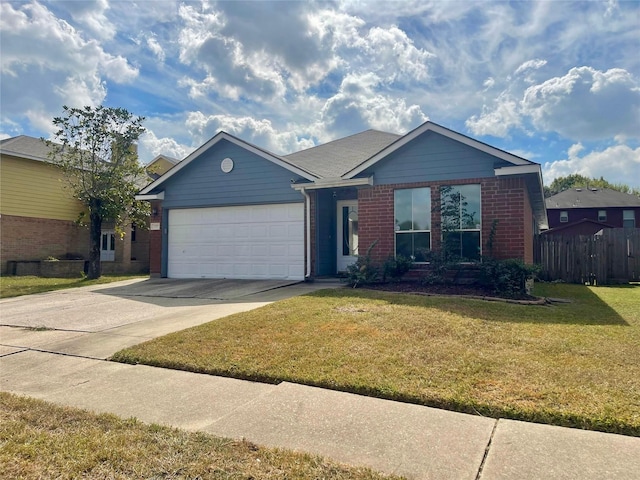 ranch-style home with a garage and a front yard