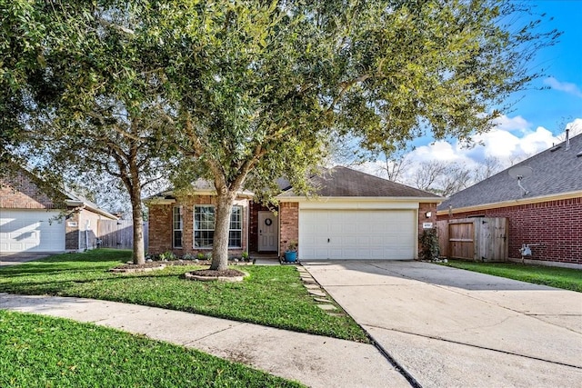 view of front facade featuring a garage and a front lawn