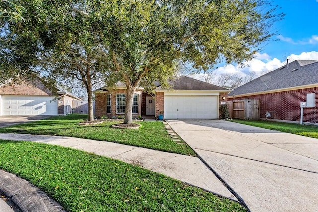 single story home featuring a front lawn