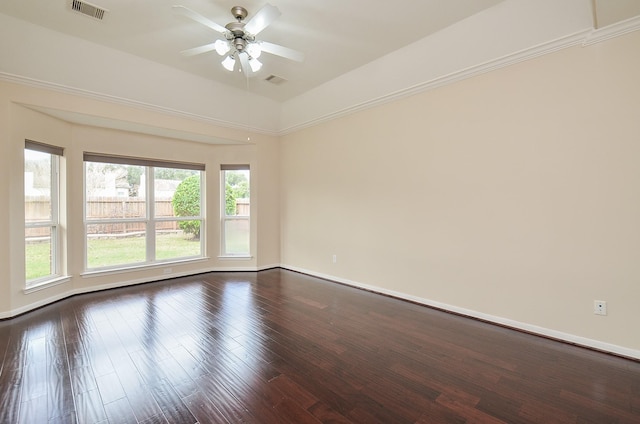 unfurnished room with dark hardwood / wood-style floors, vaulted ceiling, and ceiling fan