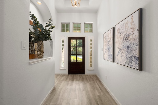 foyer with light hardwood / wood-style floors