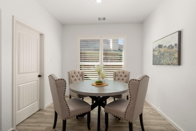 dining area featuring light hardwood / wood-style floors