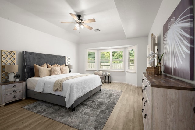 bedroom featuring ceiling fan and light hardwood / wood-style flooring