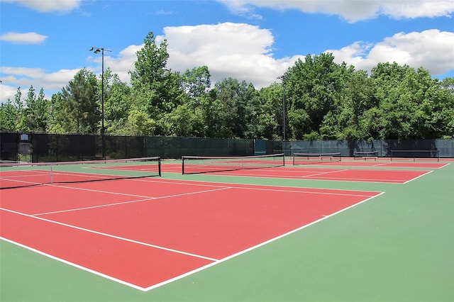 view of tennis court with basketball court