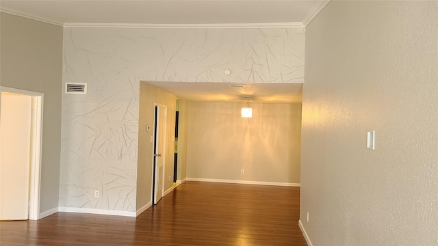 hallway with dark hardwood / wood-style floors and ornamental molding