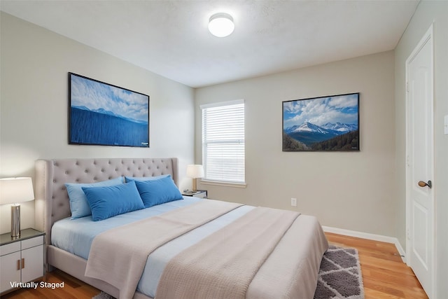 bedroom featuring light hardwood / wood-style floors