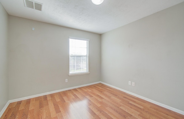 empty room featuring light hardwood / wood-style flooring