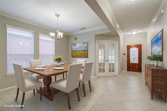 dining area with french doors, an inviting chandelier, crown molding, and light tile patterned flooring