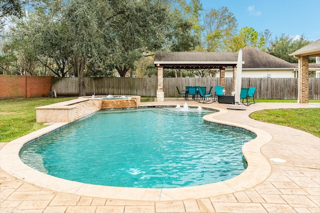 view of swimming pool featuring an in ground hot tub, pool water feature, and a patio