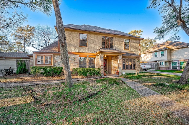 view of front of home with a front lawn