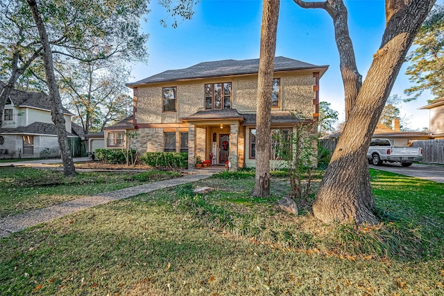 view of front of property with a front lawn