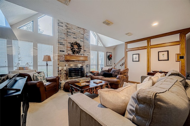 living room with a fireplace, carpet, and vaulted ceiling