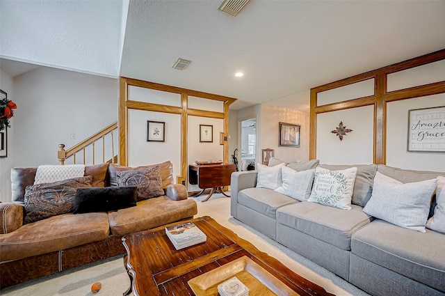 living room featuring light carpet