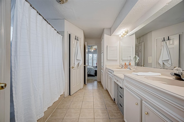 bathroom with vanity, tile patterned floors, and ceiling fan