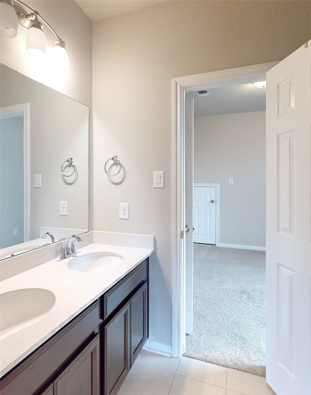 bathroom featuring vanity and tile patterned floors