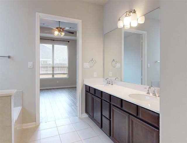 bathroom with vanity, tile patterned flooring, and ceiling fan