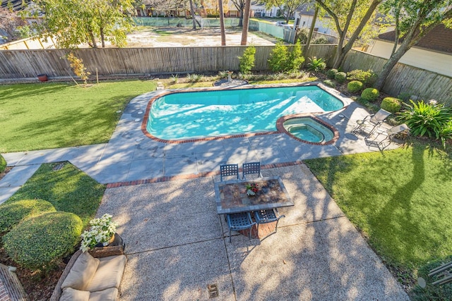 view of swimming pool with a patio area, an in ground hot tub, and a yard