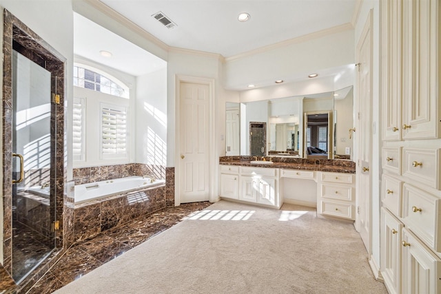 bathroom featuring vanity, separate shower and tub, and ornamental molding