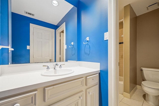 full bathroom featuring toilet, vanity,  shower combination, and tile patterned floors