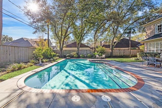 view of swimming pool featuring a patio