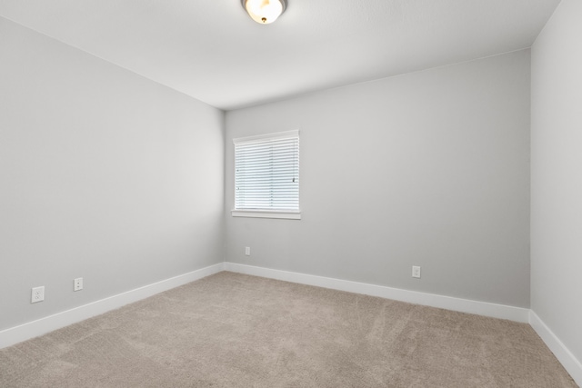 empty room featuring carpet floors